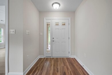 Spacious entryway greets guests.