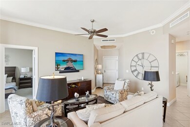 Living room featuring light tile patterned floors,