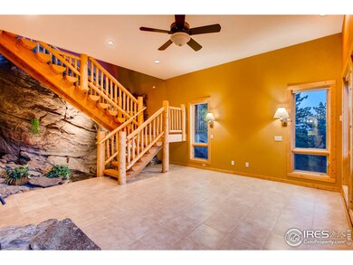 Master bedroom with exposed rock