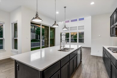 Kitchen with a sink, stainless steel appliances, 