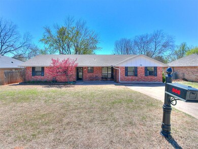 Single story home with a front lawn