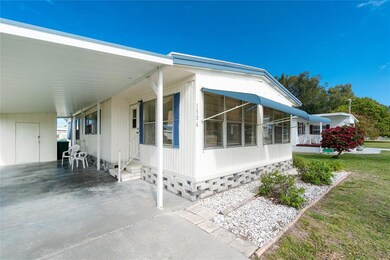 Front view  showing the patio/car port.