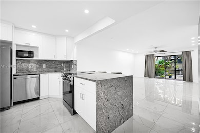 132 S Cypress Rd unit 518, Pompano Beach, FL 33060 - photo 7