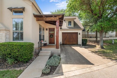 View of front of house featuring concrete drivewa