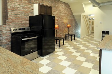Kitchen looking into Living Area.
