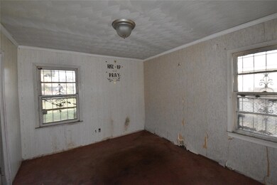 Unfurnished room with crown molding