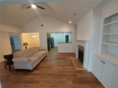 Living area featuring wood finished floors, ceilin