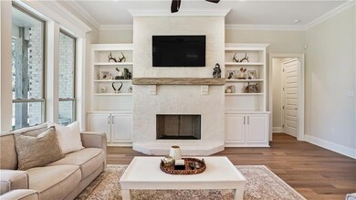 Living Area with Sacked Brick Fireplace and Built-