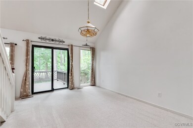 Spare room featuring a skylight, plenty of natural