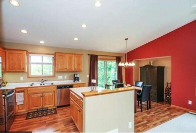 Custom Oak Cabinets with island and appliances.  T