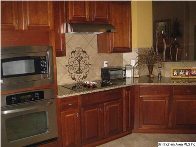 Terrific Kitchen with Granite Countertops and Stai