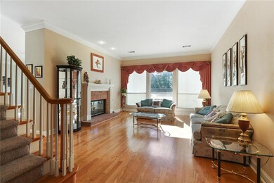 Formal Living Room with a 2-face fireplace serving