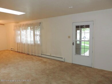 Living Room Looking to Front Door