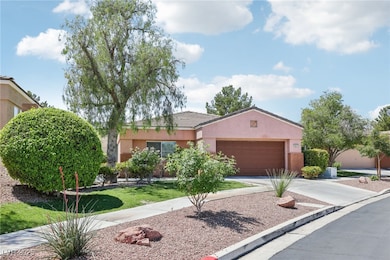 Ranch-style home with stucco siding, concrete driv