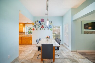 Discover the inviting breakfast room just off the