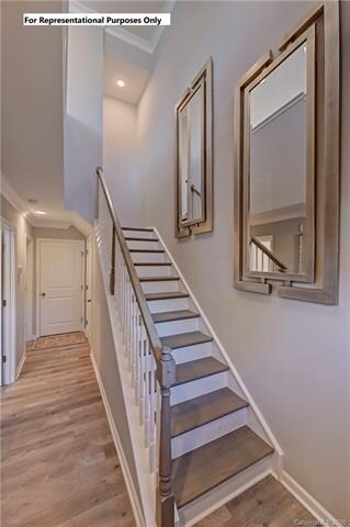 Front door entrance boasts a beautiful two story f