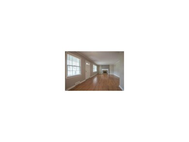 This view encompasses the Family Room and Dining a