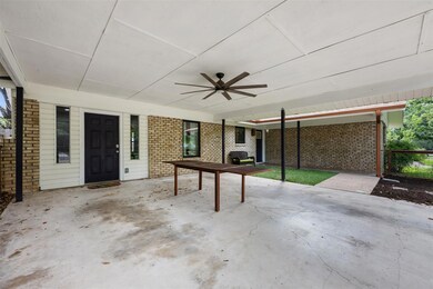 View of patio featuring ceiling fan