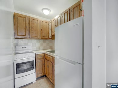 Harrison Park Towers unit 16O, East Orange, NJ 07018 - photo 2