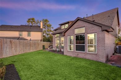 The backyard features new fencing, updated landscaping, and a wide stretch of green space for outdoor living. Clean lines and an open layout make it both functional and low maintenance. A private backdrop that feels polished and ready for anything.
