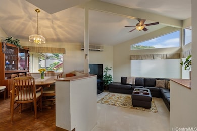Enter into your step-down living area and spacious