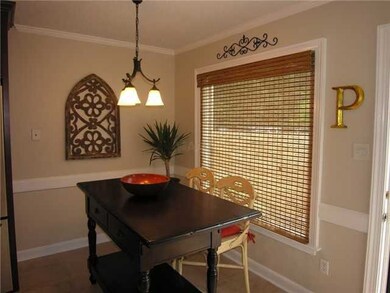 Eat-in breakfast area with new wrought iron lighti