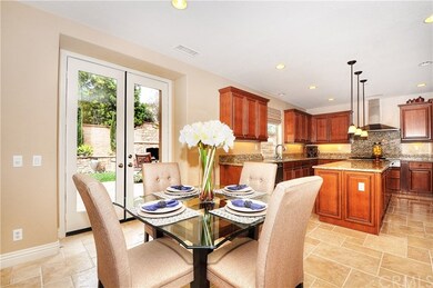 Open to the oversized and spacious family room, th