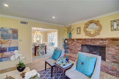 View from living room toward formal dining with cu
