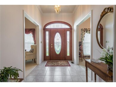 Beautiful foyer with an abundance of natural light