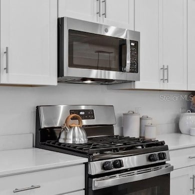 A new stainless steel gas range and built-in microwave are indispensable to home cooks