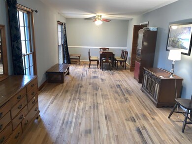 Living room, hardwood floors need refinishing