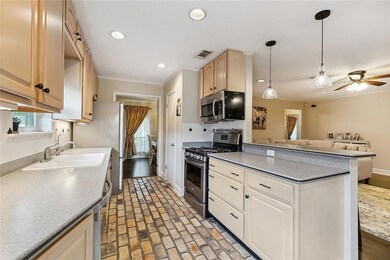 Light colored cabinets with Corian countertops! St