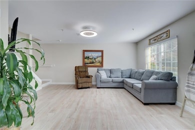 Living room featuring light hardwood / wood-style