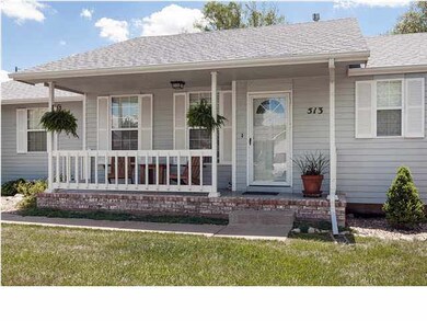 Charmed and Cozy front porch!