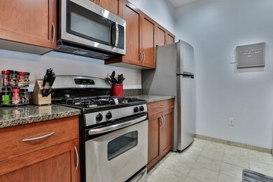 Spicket Commons unit 313, Methuen, MA 01844 - photo 4