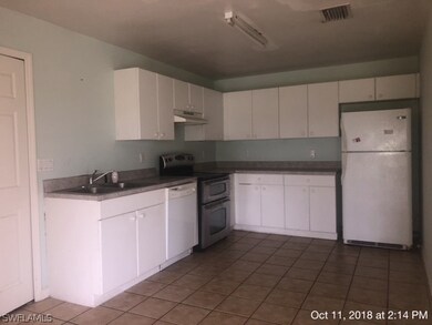 945 Chenault St, Lehigh Acres, FL 33974 - photo 2