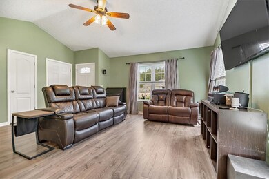 Beautiful laminate flooring is found throughout th