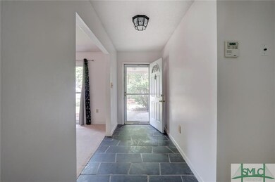 Slate tile in foyer.