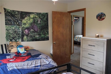 Bedroom featuring carpet