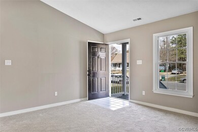 Livingroom with view of front entry to home.