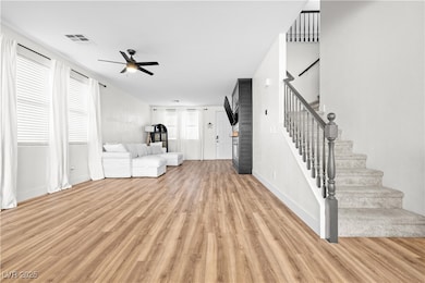 Unfurnished room featuring visible vents, a ceilin