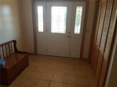 Foyer provides plenty of room for any guests...