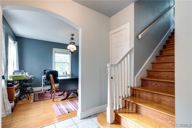 Enter through the Foyer, featuring a convenient coat closet & access to the Formal Dining & Living Rooms.