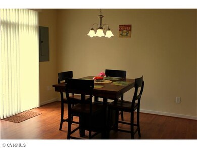 Kitchen - Dining area leads to the private fenced 
