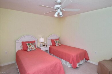 Dining room with ceiling fan with notable chandeli