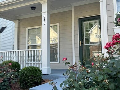 View of exterior entry with a porch