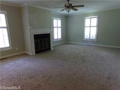 Den/Family/Great Room. Bright living room with wood burning fireplace. There is enough room on the main level for a large gathering of friends.