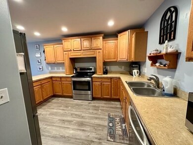 Service entry from kitchen to 2 car heated garage.