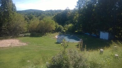 Inground pool to right in picture