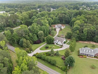 Drone / aerial view of a heavily wooded area